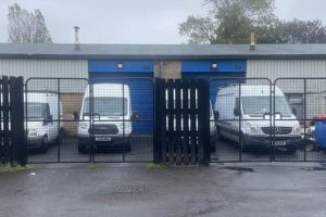 Transit vans of a company that has goes into administration parked up awaiting sale by the receivers